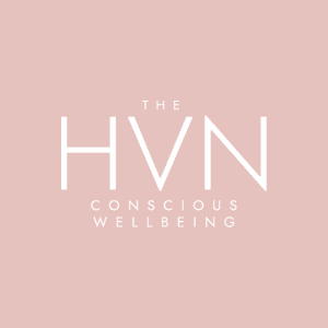 The HVN logo: the words THE HVN CONSCIOUS WELLBEING in white on a soft pink background
