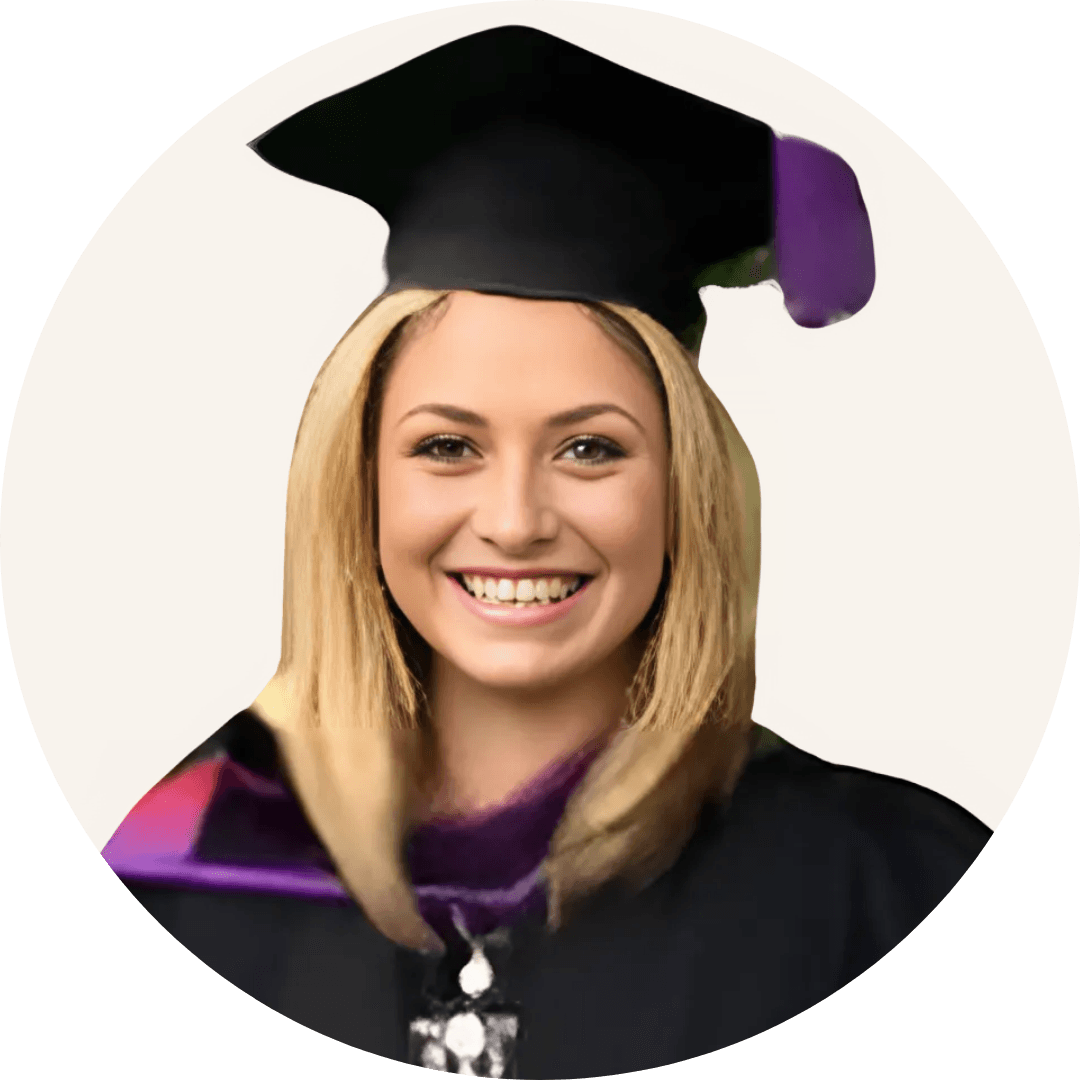 Millie Watson smiling, with long blonde hair, wearing a graduation cap and gown