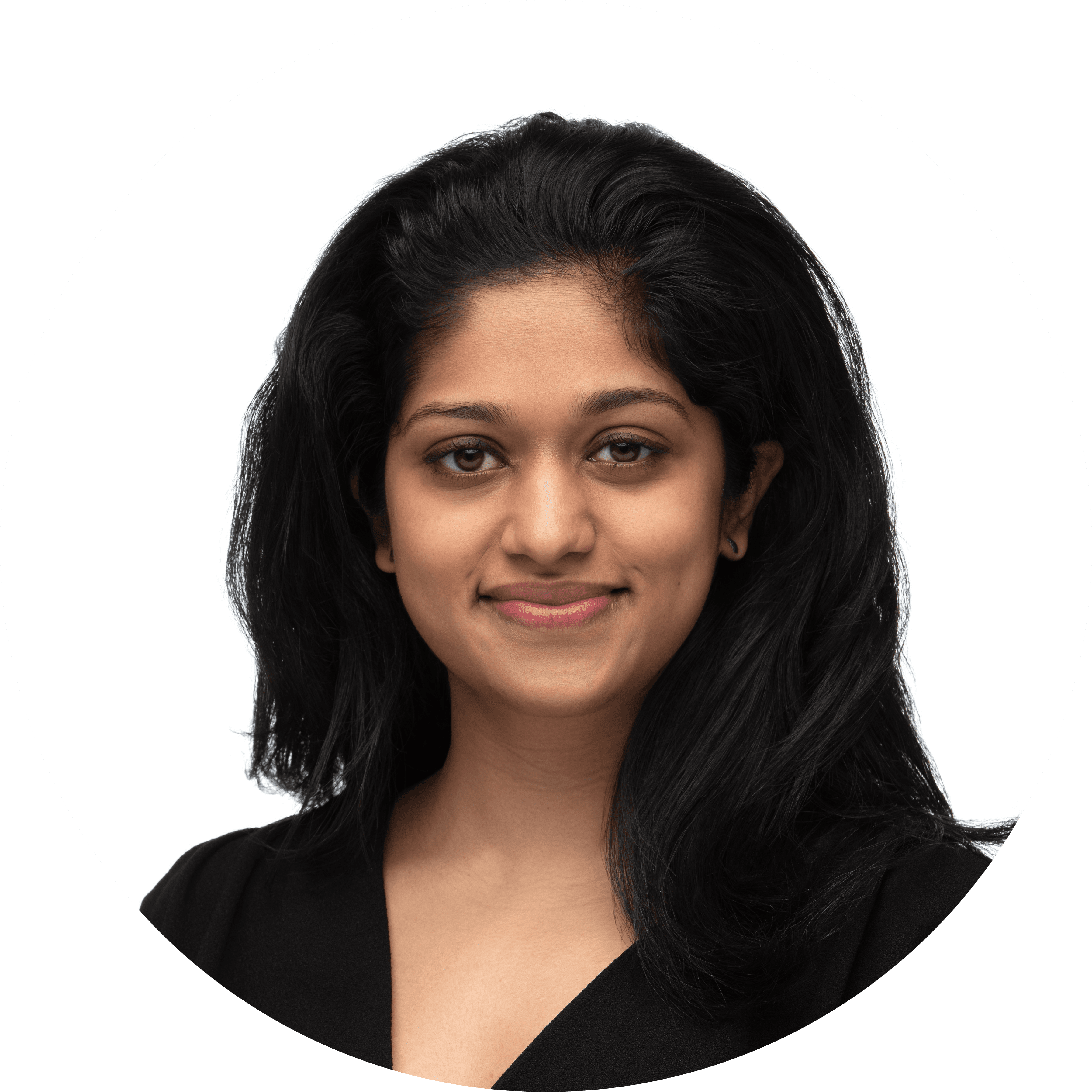 Dr Kahverry Rajeswaran smiling, with long dark hair, wearing a black top